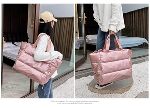 Pink puffer quilted sports bag for women showing shoulder and handheld styles in detail