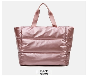 Rear view of a pink quilted waterproof fitness bag with metallic finish and durable straps