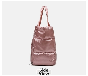 Close-up of pink metallic puffer bag side with zipper detail and sturdy strap handle