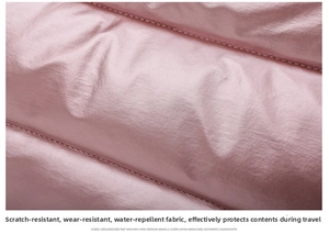 Detail of pink quilted water-resistant and scratch-resistant fabric on fitness bag