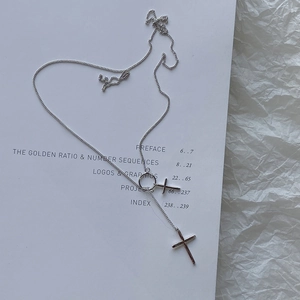 Minimalist 925 sterling silver cross pendant necklace on a clean white background