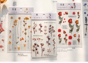 Detailed view of PET transparent floral stickers featuring roses and cotton for journaling