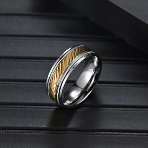 Minimalist titanium steel ring for men with golden diagonal pattern and gear edges
