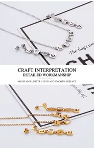 Detail view of LOVE letter jewelry sets with square zircon in silver and gold finishes