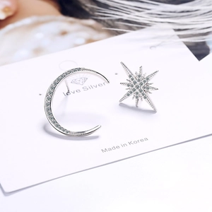 Asymmetric silver moon and star stud earrings set with sparkling cubic zirconia stones