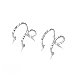 Detail of 316L stainless steel helix ear cuffs in gold and silver finishes, 10x8mm size