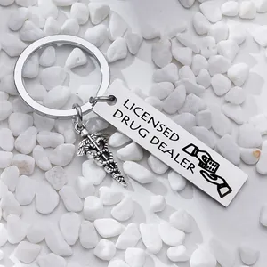 Stainless steel keychain with Caduceus charm and Licensed Drug Dealer engraving