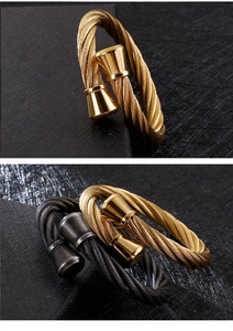 Macro view of twisted cable titanium steel bangle in gold and charcoal finishes