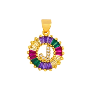 Macro view of gold J letter pendant with colorful zircon stones and fine details