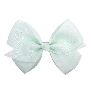 Detail of light mint green grosgrain ribbon bow hair clip with fine ribbed texture