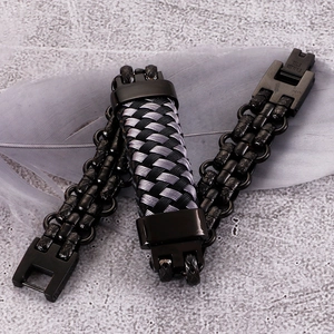 Men's retro braided stainless steel bracelet with black and silver curved metal clasp