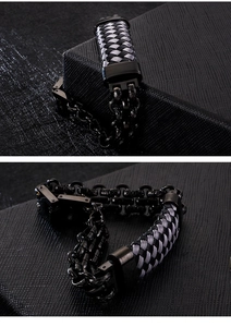Macro detail of men's titanium steel bracelet showing woven chain and metal clasp