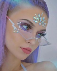 Detail of rimless lightning shaped sunglasses with colorful face rhinestones and sequins