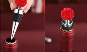 Zinc alloy wine stopper with a red crystal diamond ball top in detail macro view