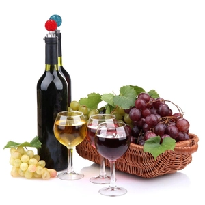 Sparkling crystal ball wine bottle stoppers with diamond accents in red and blue colors