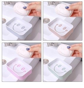 Smiley face drainage holes detail on colorful double-layer soap boxes in four pastel shades