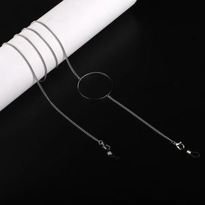 Silver stainless steel eyeglass chain with large round geometric pendant and rubber loops