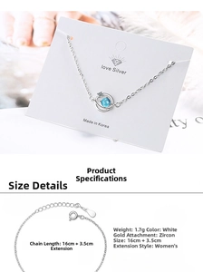 Detail view of silver planet necklace with blue zircon and size specifications