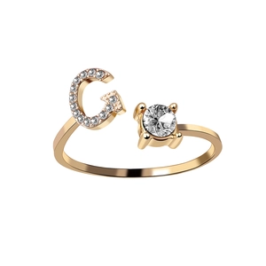 Adjustable golden open ring with crystal-encrusted letter G and a round solitaire stone