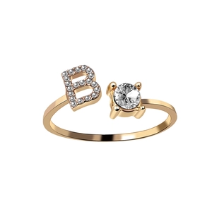 Adjustable gold letter B ring with shimmering crystals and a central round zircon stone