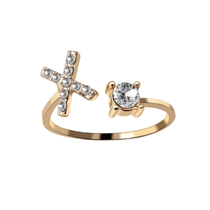 Adjustable golden ring with sparkling diamond-set X symbol and a round cubic zirconia