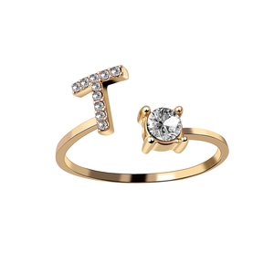 Adjustable gold letter T ring featuring sparkling diamonds and a round cubic zirconia