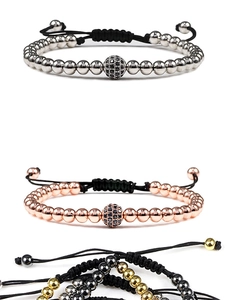 Detailed close-up of woven adjustable bracelets with micro-pave zircon metal spheres