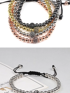 Detail view of adjustable braided rope bracelet with micro-pave cubic zirconia ball bead
