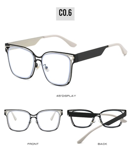 Three-angle view of black and silver oversized glasses frames with two-tone temples