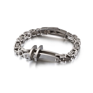 Classic silver Byzantine chain bracelet for men with geometric cross detail on white background