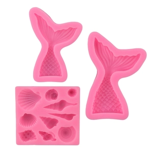 Detailed pink silicone molds set featuring mermaid tails, shells, and starfish shapes
