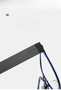 Close-up of black matte eyeglass temples with blue inner lining and flexible metal hinge
