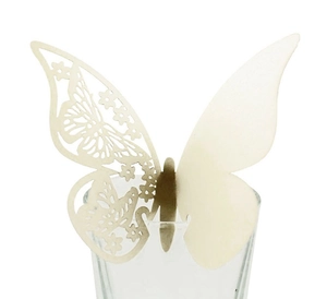 Detail of 3D laser-cut butterfly place card in ivory paper for wine glass decor
