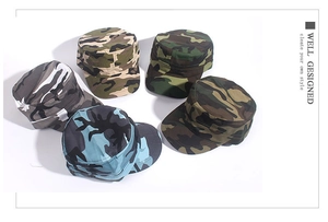 Top view of five flat top military camouflage caps in various colors for outdoor wear
