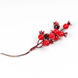 Artificial red berry stems for Christmas tree decorations and DIY festive wreaths