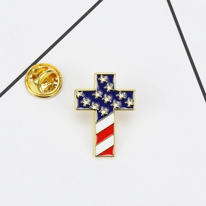 Detailed view of the cross-shaped US flag enamel pin with a secure butterfly clutch back