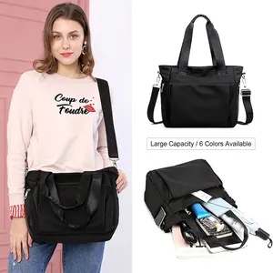 Large capacity black nylon shoulder bag for women with multi-zipper pockets and wide strap