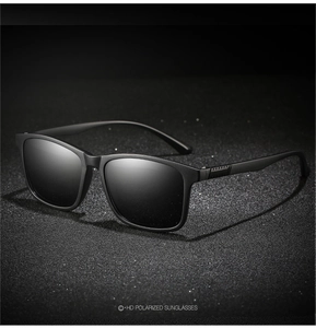 Detailed macro view of matte black TR polarized sunglasses frame and dark grey lenses
