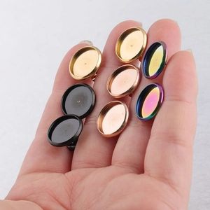Close-up of DIY earring base trays in gold, rose gold, black, and rainbow finishes