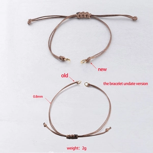 Adjustable 0.8mm brown wax cord bracelet with gold metal rings in a new version design