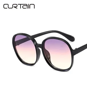 Classic round oversized sunglasses with black frame and purple-orange gradient lenses
