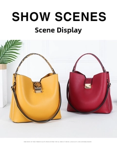 Detail of yellow and red matte leather tote bags with snakeskin texture straps and metal buckles
