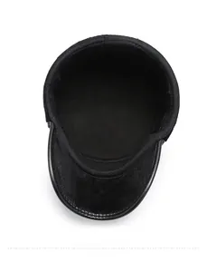 Detail of warm black flat cap showing soft fleece lining and faux fur trim for winter
