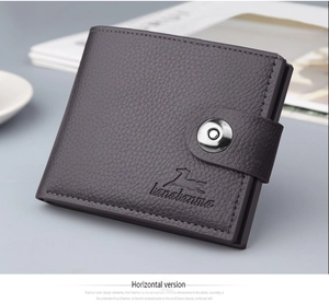 Detail of dark grey lychee pattern leather wallet with secure metal snap closure buckle
