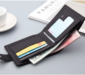 Detail view of men's bifold wallet interior showing card slots and snap button closure
