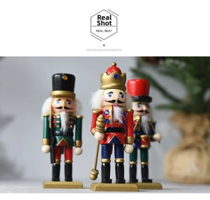 Detailed view of hand-painted wooden nutcracker soldiers with fur beards for Christmas