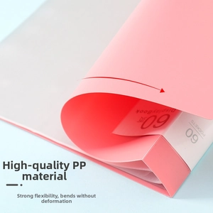 Detail view of flexible pink A4 folder showing durable PP material with 60 pockets