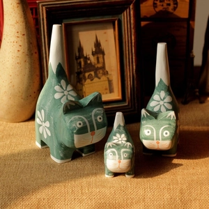 Set of three hand-painted wooden cat figurines in vintage teal with floral pattern