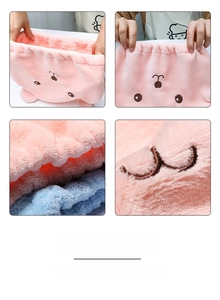 Detail showing plush microfiber material and cute bear embroidery on drying caps
