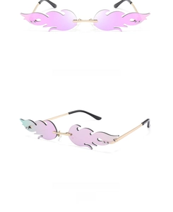 Close-up of pink flame shaped rimless sunglasses with high quality metal frames